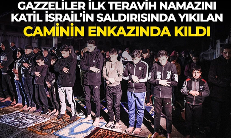 Gazzeliler, ilk teravih namazn srail saldrsnda yklan caminin enkaznda kld